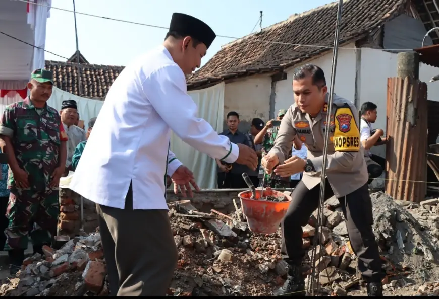 HUT Bhayangkara Ke – 78, Polres Nganjuk Gandeng Baznas Peletakan Batu Pertama Bedah Rumah