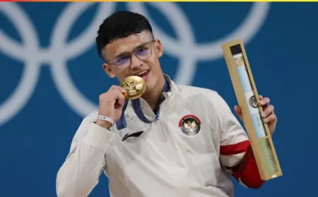 Lifter Rizki Juniansyah Raih Emas Kedua Indonesia di Olimpiade Paris 2024.
